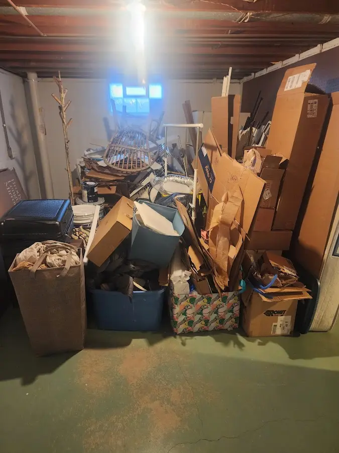 Roll-off dumpster container at job site for 15 Yard Dumpster Rental in Wyndham